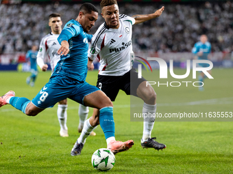 Vitor Roque and Steve Kapuadi  are playing during UEFA Conference League match between Legia Warsaw and Real Betis in Warsaw Poland on 3 Oct...