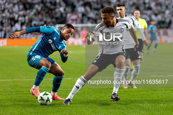 Vitor Roque and Steve Kapuadi  are  playing during UEFA Conference League match between Legia Warsaw and Real Betis in Warsaw Poland on 3 Oc...