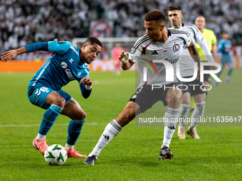 Vitor Roque and Steve Kapuadi  are  playing during UEFA Conference League match between Legia Warsaw and Real Betis in Warsaw Poland on 3 Oc...