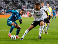 Vitor Roque and Steve Kapuadi  are  playing during UEFA Conference League match between Legia Warsaw and Real Betis in Warsaw Poland on 3 Oc...