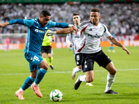 Vitor Roque and  Steve Kapuadi  are playing during UEFA Conference League match between Legia Warsaw and Real Betis in Warsaw Poland on 3 Oc...