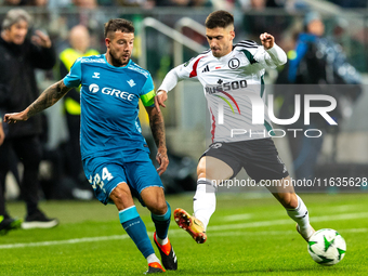 Vitor Roque and Ruben Vinagre  are playing during UEFA Conference League match between Legia Warsaw and Real Betis in Warsaw Poland on 3 Oct...