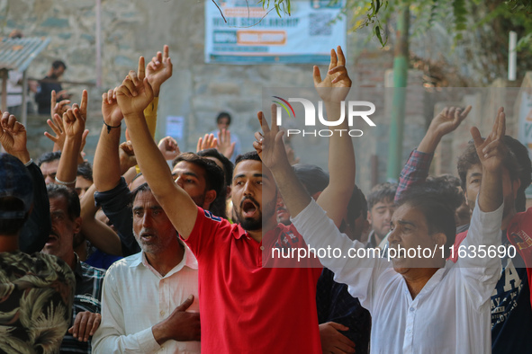 Kashmiri Shia Muslims shout slogans during a protest against Israel following the killing of Lebanon's Hezbollah leader Sayyed Hassan Nasral...