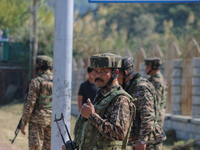 An Indian paramilitary soldier stands guard during a protest against Israel following the killing of Lebanon's Hezbollah leader Sayyed Hassa...