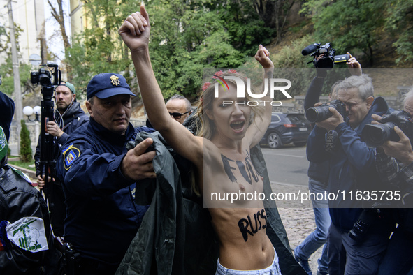 Members of the FEMEN Ukraine group stage a protest in front of the Iranian Embassy in Kyiv, Ukraine, on October 4, 2024, against the deliver...