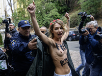 Members of the FEMEN Ukraine group stage a protest in front of the Iranian Embassy in Kyiv, Ukraine, on October 4, 2024, against the deliver...