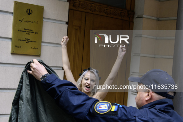 Members of the FEMEN Ukraine group stage a protest in front of the Iranian Embassy in Kyiv, Ukraine, on October 4, 2024, against the deliver...