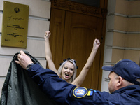 Members of the FEMEN Ukraine group stage a protest in front of the Iranian Embassy in Kyiv, Ukraine, on October 4, 2024, against the deliver...