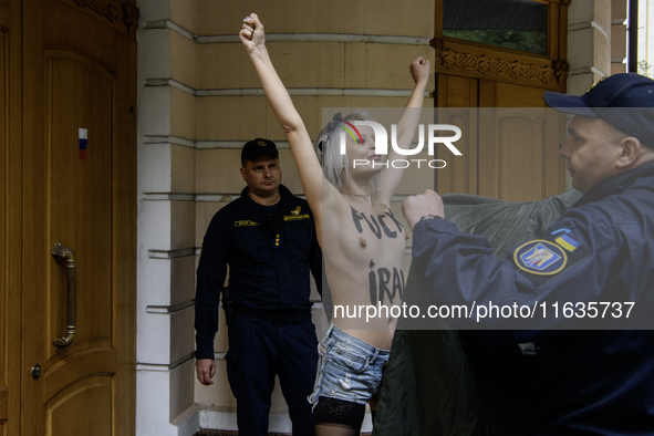 Members of the FEMEN Ukraine group stage a protest in front of the Iranian Embassy in Kyiv, Ukraine, on October 4, 2024, against the deliver...