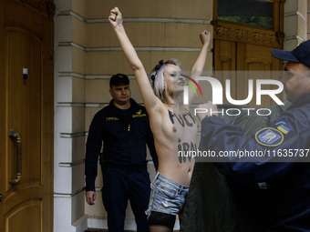 Members of the FEMEN Ukraine group stage a protest in front of the Iranian Embassy in Kyiv, Ukraine, on October 4, 2024, against the deliver...