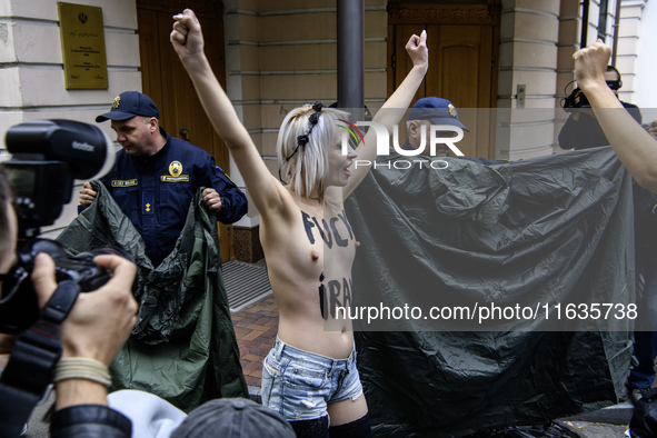 Members of the FEMEN Ukraine group stage a protest in front of the Iranian Embassy in Kyiv, Ukraine, on October 4, 2024, against the deliver...