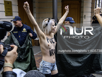 Members of the FEMEN Ukraine group stage a protest in front of the Iranian Embassy in Kyiv, Ukraine, on October 4, 2024, against the deliver...