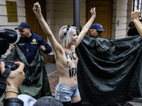 Members of the FEMEN Ukraine group stage a protest in front of the Iranian Embassy in Kyiv, Ukraine, on October 4, 2024, against the deliver...