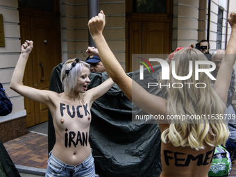 Members of the FEMEN Ukraine group stage a protest in front of the Iranian Embassy in Kyiv, Ukraine, on October 4, 2024, against the deliver...