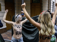 Members of the FEMEN Ukraine group stage a protest in front of the Iranian Embassy in Kyiv, Ukraine, on October 4, 2024, against the deliver...