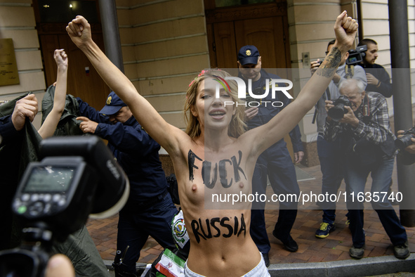 Members of the FEMEN Ukraine group stage a protest in front of the Iranian Embassy in Kyiv, Ukraine, on October 4, 2024, against the deliver...