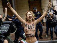 Members of the FEMEN Ukraine group stage a protest in front of the Iranian Embassy in Kyiv, Ukraine, on October 4, 2024, against the deliver...