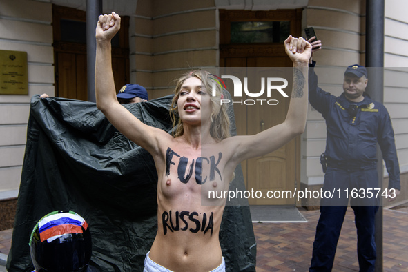 Members of the FEMEN Ukraine group stage a protest in front of the Iranian Embassy in Kyiv, Ukraine, on October 4, 2024, against the deliver...