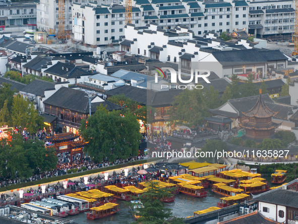 Tourists visit the Confucius Temple in Nanjing, China, on October 4, 2024. 