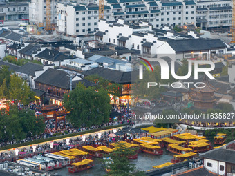 Tourists visit the Confucius Temple in Nanjing, China, on October 4, 2024. (