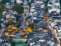 Tourists visit the Confucius Temple in Nanjing, China, on October 4, 2024. (