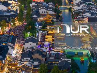 Tourists visit the Confucius Temple in Nanjing, China, on October 4, 2024. (