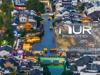 Tourists visit the Confucius Temple in Nanjing, China, on October 4, 2024. (