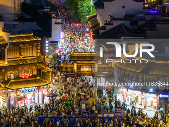 Tourists visit the Confucius Temple in Nanjing, China, on October 4, 2024. (