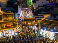 Tourists visit the Confucius Temple in Nanjing, China, on October 4, 2024. (