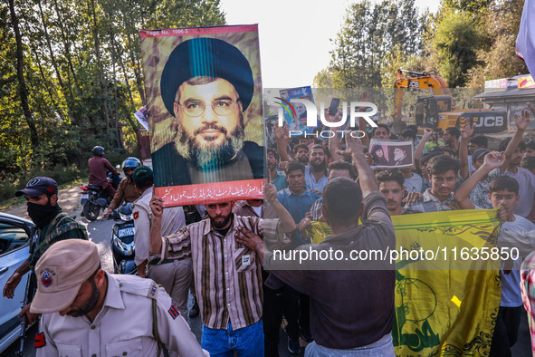 Shia men shout slogans against Israel in Baramulla, Jammu and Kashmir, India, on October 4, 2024. Protests erupt in Baramulla District again...