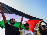 Shia men shout slogans against Israel in Baramulla, Jammu and Kashmir, India, on October 4, 2024. Protests erupt in Baramulla District again...