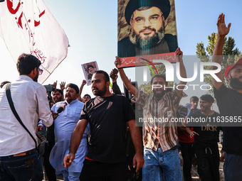 Shia men shout slogans against Israel in Baramulla, Jammu and Kashmir, India, on October 4, 2024. Protests erupt in Baramulla District again...