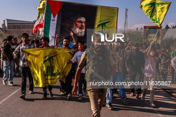 Shia men shout slogans against Israel in Baramulla, Jammu and Kashmir, India, on October 4, 2024. Protests erupt in Baramulla District again...