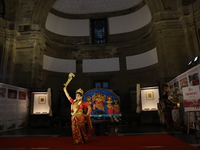 A dancer performs the ''Durgotsab'' dance dressed as goddess Durga ahead of the Durga Puja festival inside the historic Victoria Memorial mo...