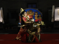 A performer performs the ''Durgotsab'' dance dressed as goddess Durga ahead of the Durga Puja festival inside the historic Victoria Memorial...