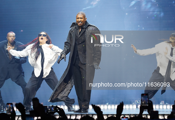 American singer, songwriter, and dancer Usher Raymond IV, known as Usher, performs on stage during the Usher: Past Present Future Tour at th...