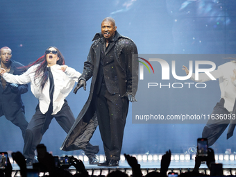 American singer, songwriter, and dancer Usher Raymond IV, known as Usher, performs on stage during the Usher: Past Present Future Tour at th...