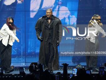 American singer, songwriter, and dancer Usher Raymond IV, known as Usher, performs on stage during the Usher: Past Present Future Tour at th...