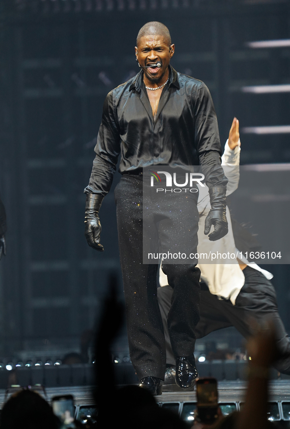 American singer, songwriter, and dancer Usher Raymond IV, known as Usher, performs on stage during the Usher: Past Present Future Tour at th...