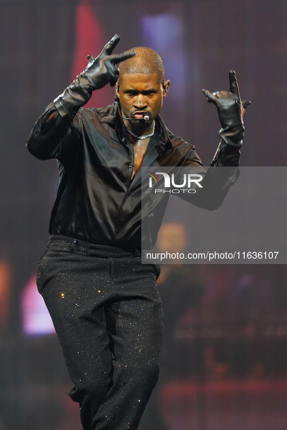 American singer, songwriter, and dancer Usher Raymond IV, known as Usher, performs on stage during the Usher: Past Present Future Tour at th...