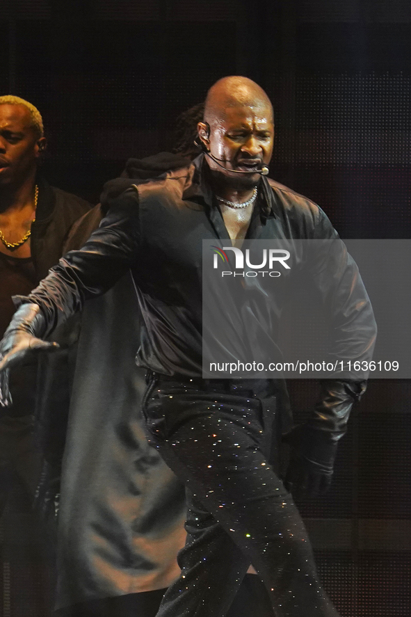 American singer, songwriter, and dancer Usher Raymond IV, known as Usher, performs on stage during the Usher: Past Present Future Tour at th...