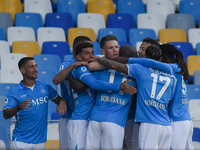 Scott McTominay of SSC Napoli celebrates with team mates after scoring during the Serie A match between SSC Napoli and Como at Stadio Diego...