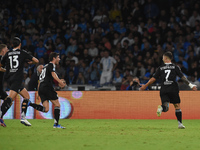 Gabriel Strefezza of Como celebrates with team mates after scoring during the Serie A match between SSC Napoli and Como at Stadio Diego Arma...