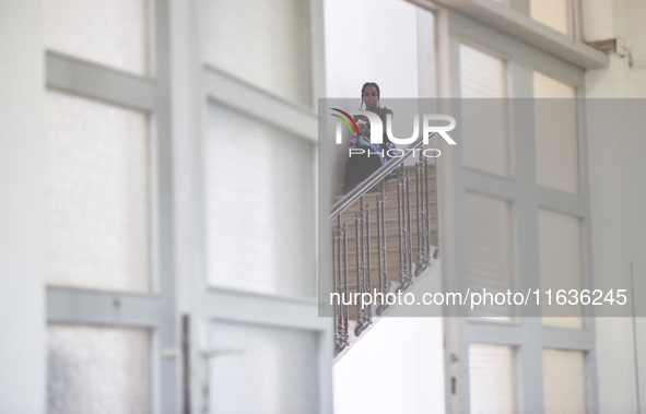 Migrant workers arrive at the Saint Joseph Jesuites Fathers Church, which is turned into a shelter to house families fleeing their homes as...