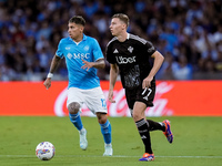 Mathias Olivera of SSC Napoli and Ignace Van Der Brempt of Como 1907 compete for the ball during the serie Serie A Enilive match between SSC...