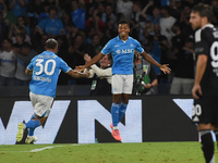 David Neres of SSC Napoli celebrates after scoring during the Serie A match between SSC Napoli and Como at Stadio Diego Armando Maradona Nap...