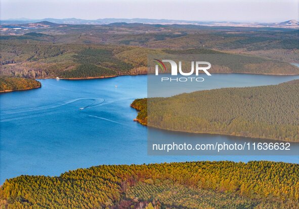 The scenery of Jingyuetan National Forest Park in Changchun, Jilin province, China, on October 4, 2024, is shown. 