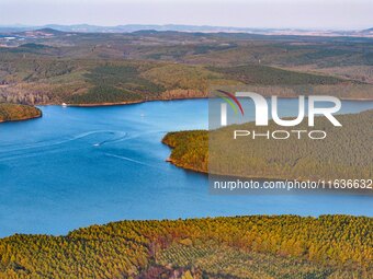 The scenery of Jingyuetan National Forest Park in Changchun, Jilin province, China, on October 4, 2024, is shown. (