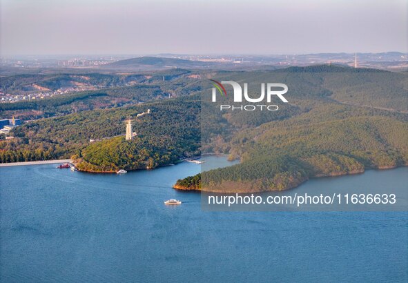 The scenery of Jingyuetan National Forest Park in Changchun, Jilin province, China, on October 4, 2024, is shown. 