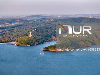 The scenery of Jingyuetan National Forest Park in Changchun, Jilin province, China, on October 4, 2024, is shown. (